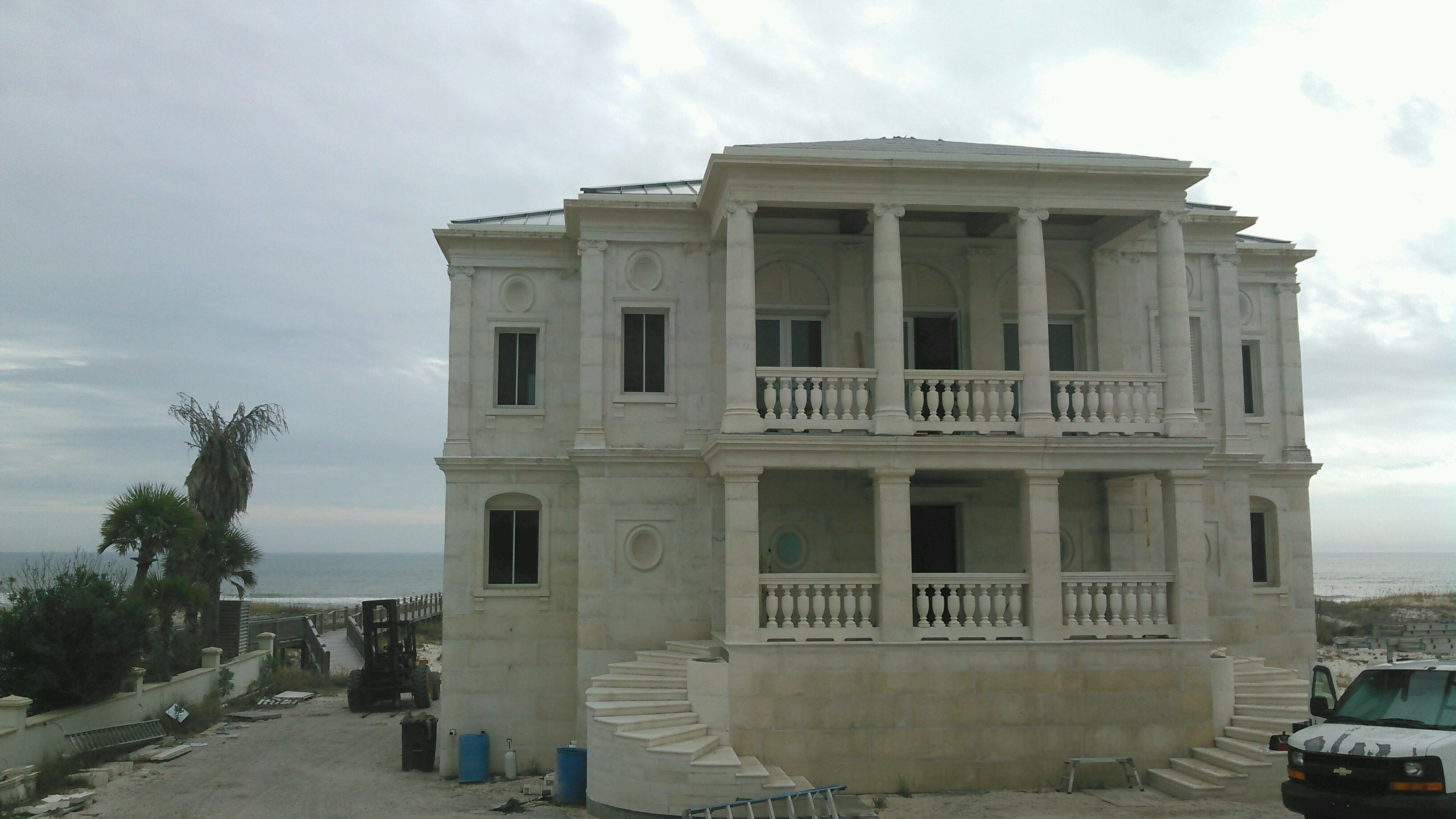 beautiful home being built by Dial Construction on the Gulf Shores AL coast in white DAC-ART stone
